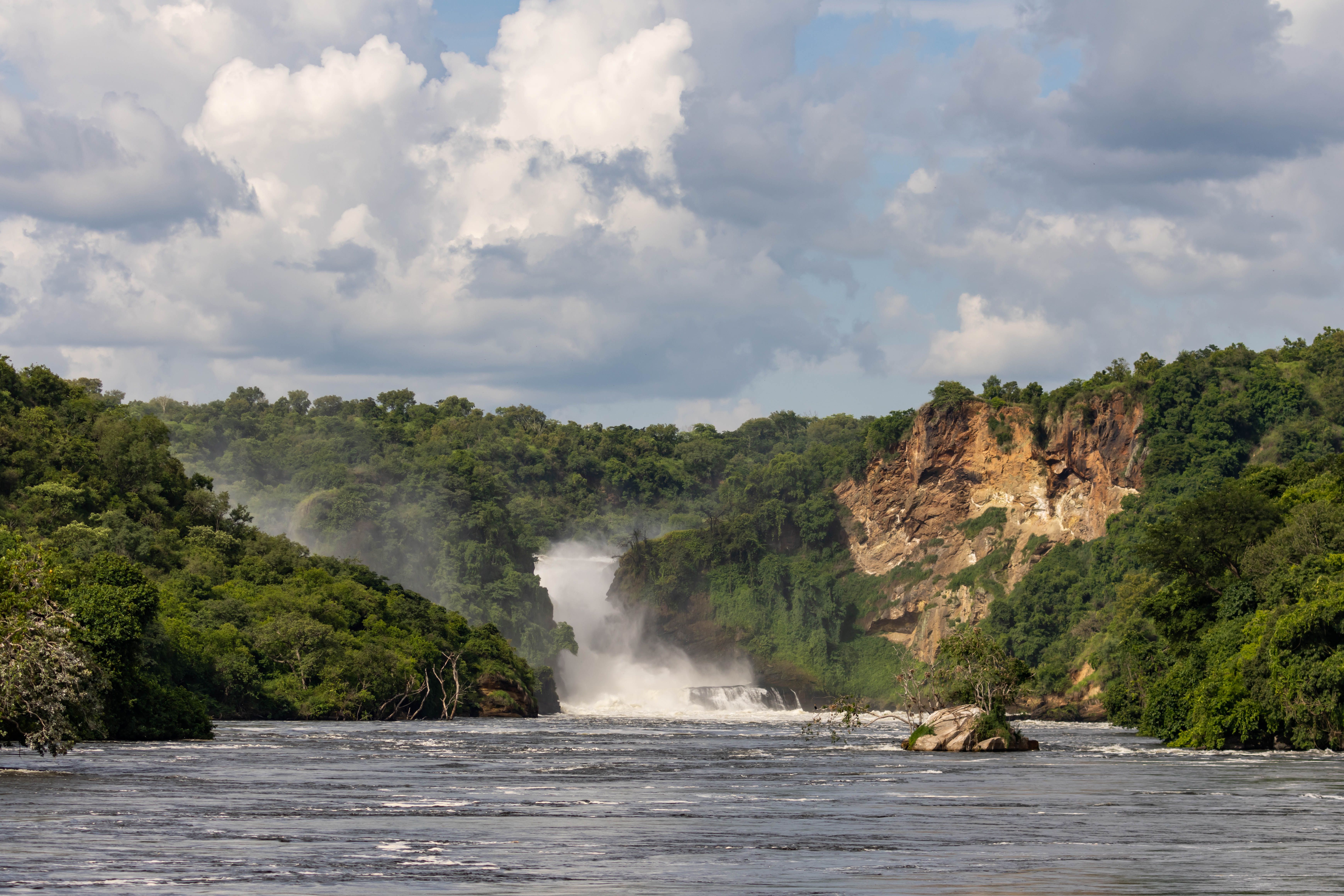Murchison Falls crashing through a forested gorge into the Nile